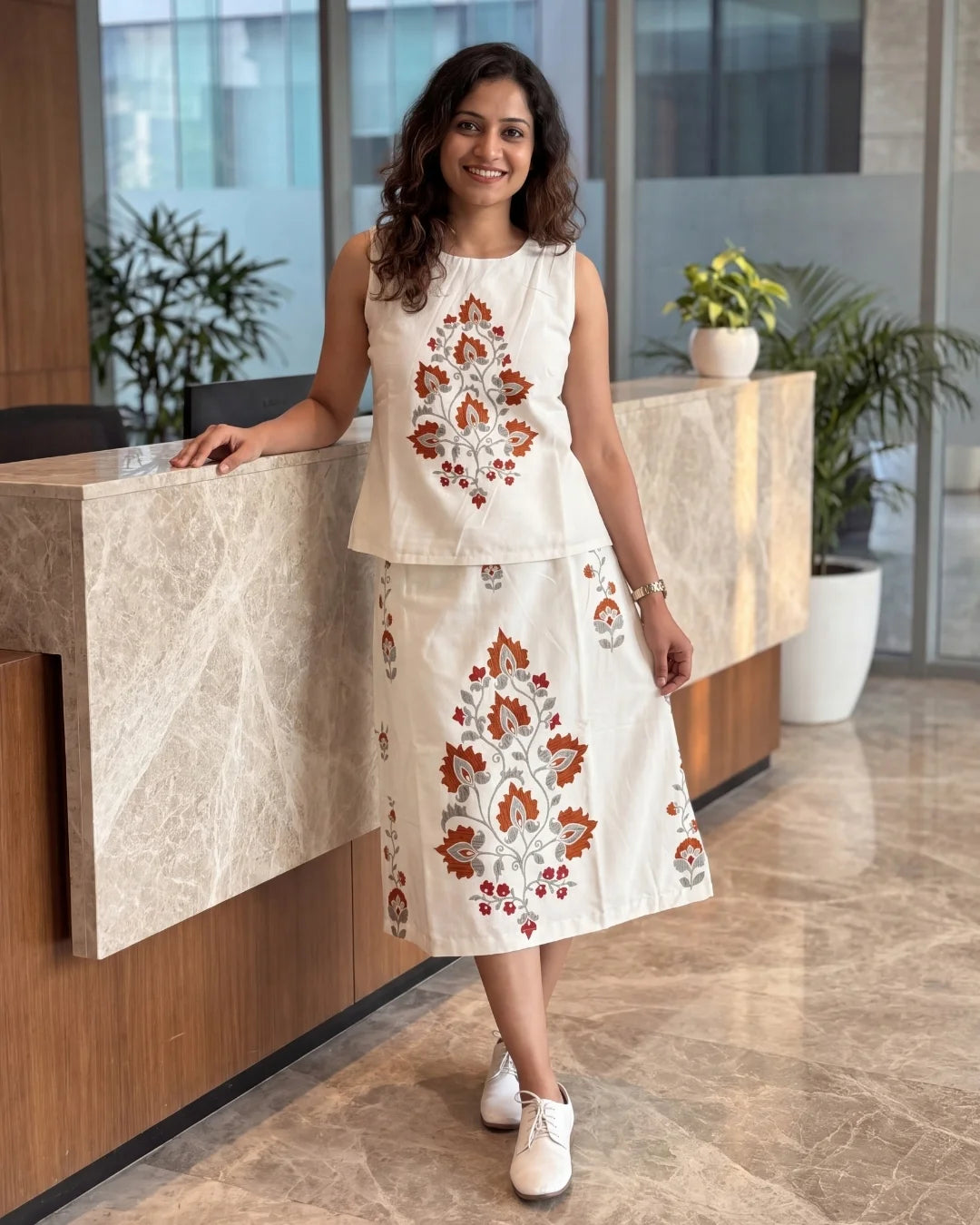 Women’s cream floral printed sleeveless top and mini skirt co-ord set by BENKQIN.
