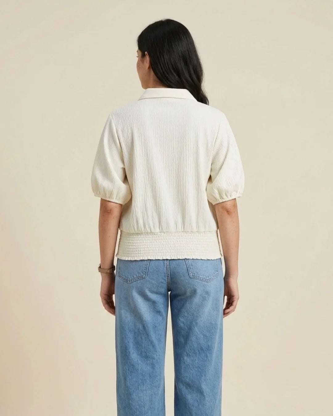 Women’s pastel cream textured top with shirt collar, puff sleeves and smocked waistband by BENKQIN.